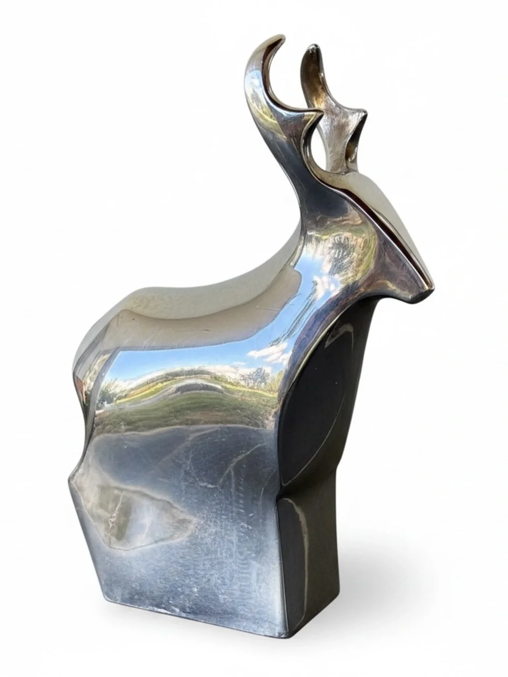 Vintage Dansk Designs Japan silver-plated reindeer figurines.